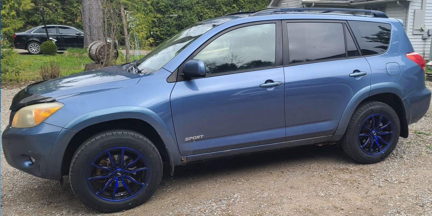 The Rav4 parked in my driveway