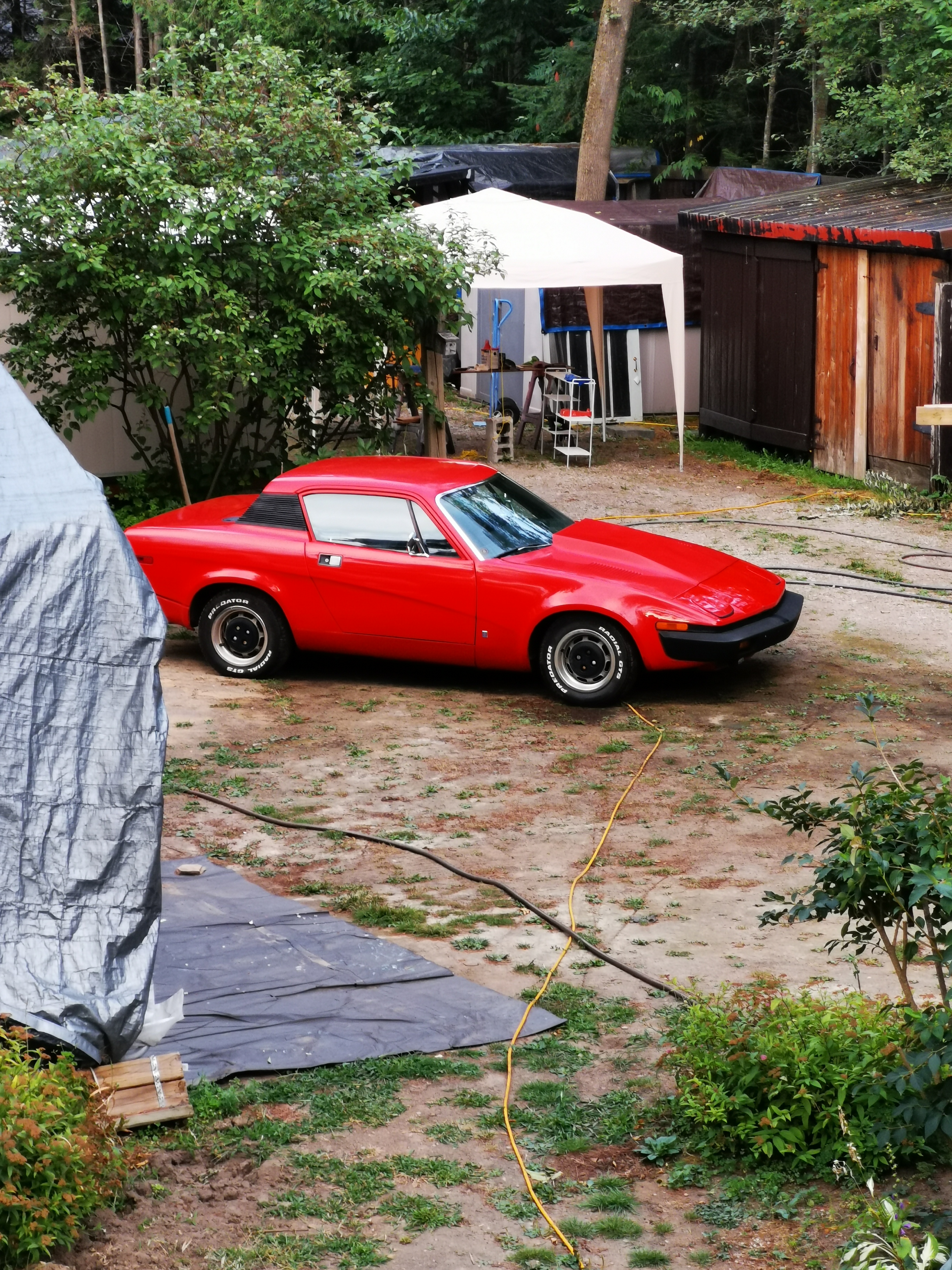 A picture of the car when it was in the back yard.