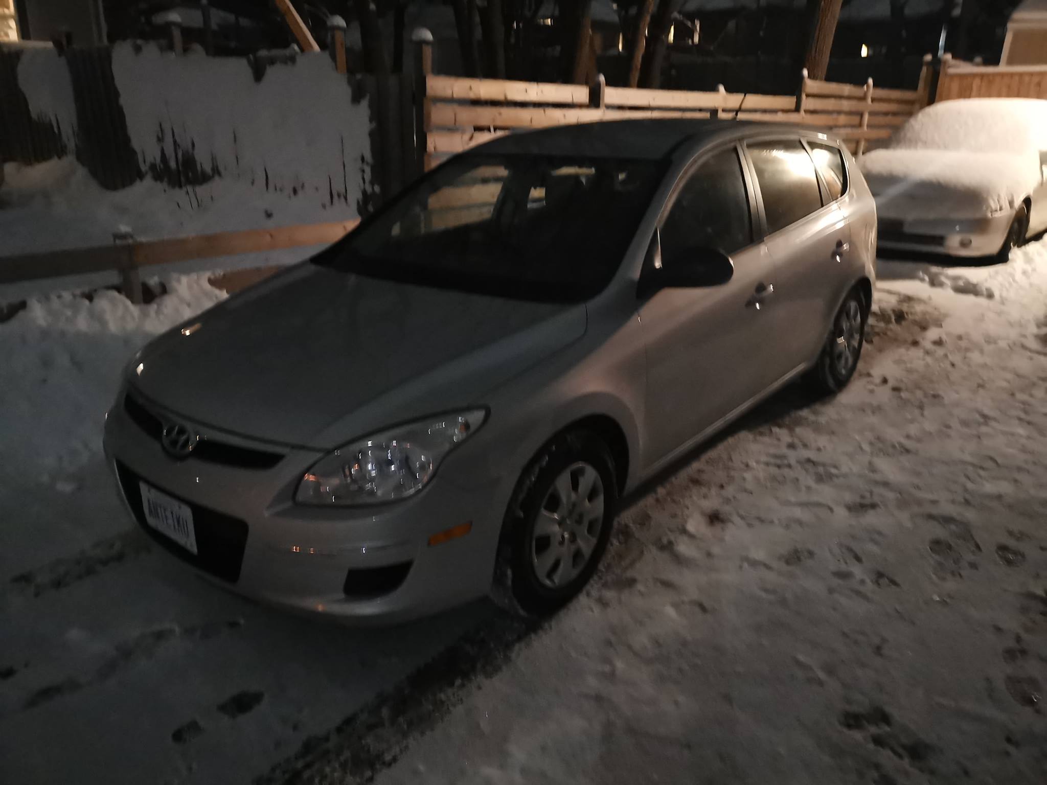 The Hyundai in front of the Altima